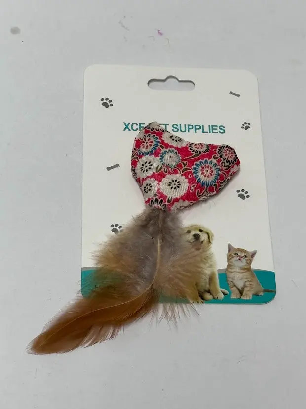 JUGUETE DE ALMOHADILLA Y PLUMA